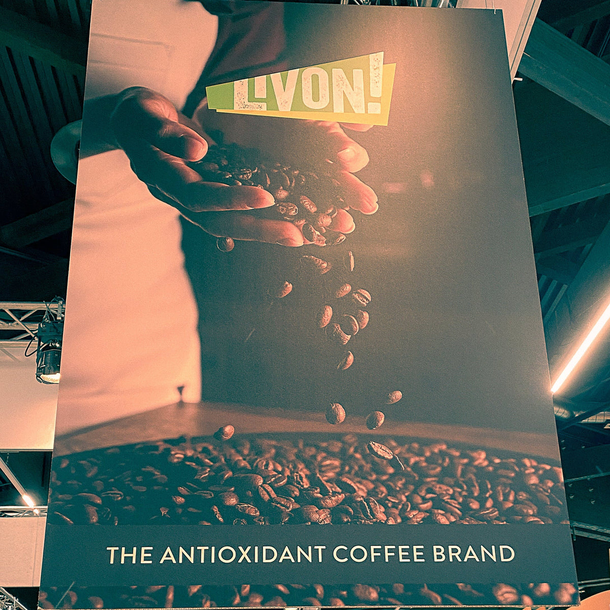 Large banner for LivOn coffee brand in an exhibition hall